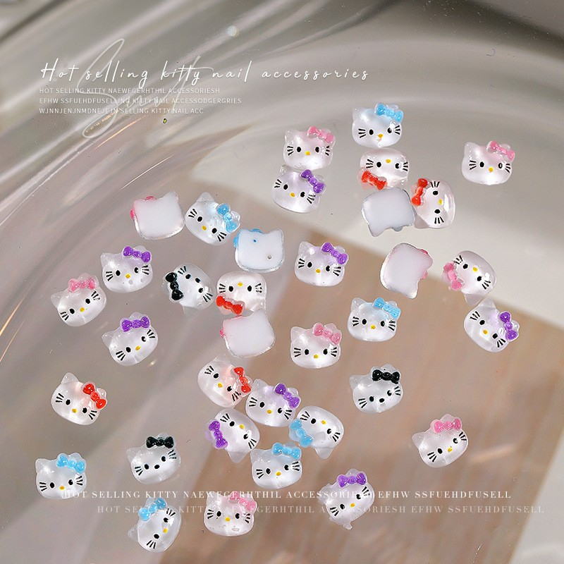 Bộ 50 phụ kiện trang trí móng tay 3D hình hello kitty xinh xắn Rou Bao