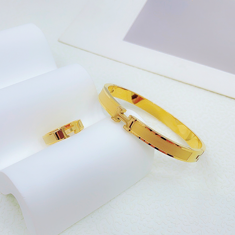 Nhẫn titan không gỉ mạ vàng 18k thiết kế mặt chữ H phong cách thời thượng trẻ trung dành cho nữ