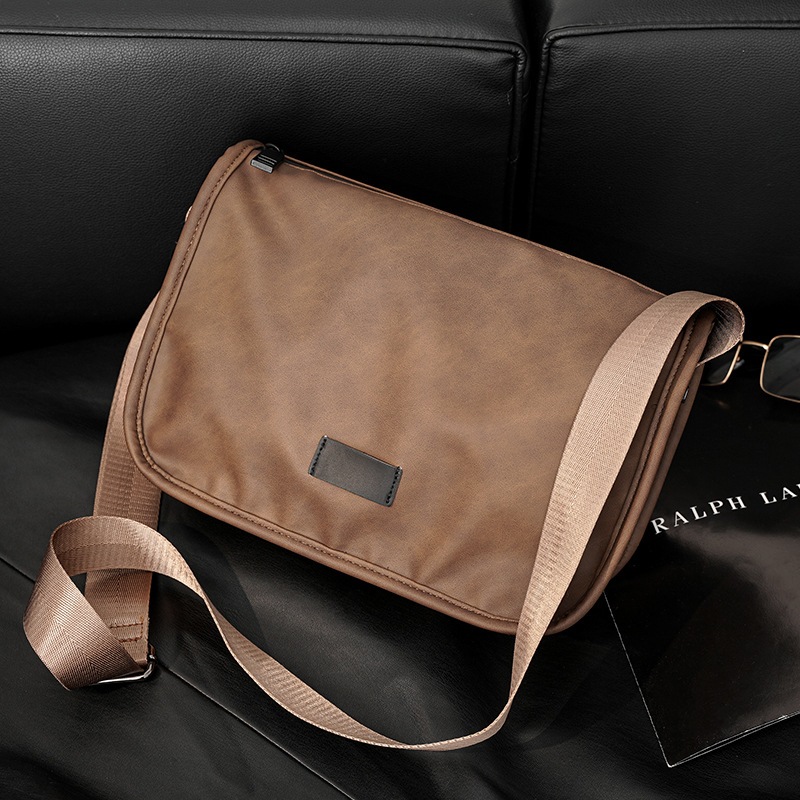 Arctic HUNTER túi xách nam xu hướng mới túi đeo vai đơn giản màu trơn Chất liệu PU mờ retro túi chéo giải trí ngoài trời phù hợp ba lô đi xe đạp