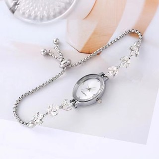 Đồng hồ nữ hình bầu dục sọc hoa mỏng thời trang với đồng hồ đeo tay có thể điều chỉnh tự do Đồng hồ thạch anh nữ