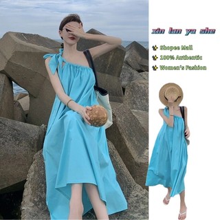 Xin LAN YA SHE Nữ mới mặc du lịch váy đi biển bên bờ biển nghiêng vai treo váy