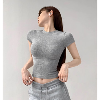 Màu bổ sung ~ Kadaishan Phiên bản va chạm cổ tròn mỏng vừa vặn của siêu bò Áo thun nửa tay ôm sát sát đáy bọc thịt hàng đầu Châu Âu Mỹ cơ bản Áo thun nửa tay co giãn cổ tròn nhỏ cơ bản của Mỹ