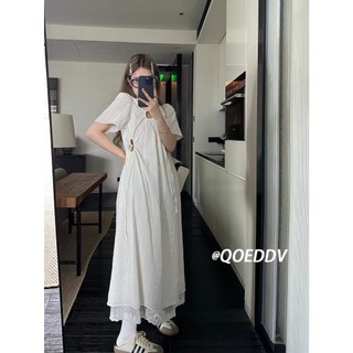 Váy chắp vá ren dây rút rỗng màu trắng váy dài