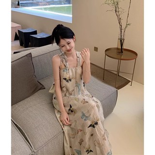 Váy treo cổ bướm đi biển