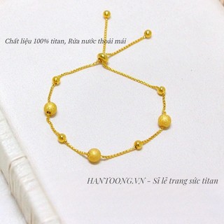 Lắc tay titan cao cấp không gỉ mạ vàng 24k dạng bi phun cát thiết kế rút sợi có thể điều chỉnh kích cỡ dành cho nữ