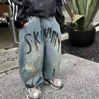 Quần Jean Bé Trai Xuân Thu Phong Cách Mới Rời Quần Trẻ Em Rách Mỹ Graffiti Phong Cách Mùa Xuân Quần Áo Trẻ Em Bố Quần