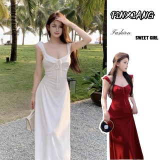 Pinxiang Nữ phong cách mới treo lưng váy hở lưng bên bờ biển ngày lễ khí chất váy dài