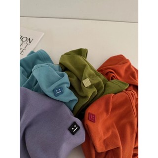 Áo thun cotton mặt cười bất đối xứng