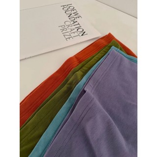 Áo thun cotton mặt cười bất đối xứng