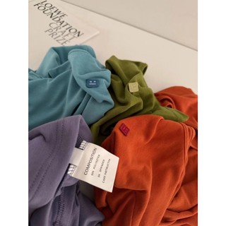 Áo thun cotton mặt cười bất đối xứng