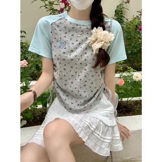 Tay áo raglan thêu, vai trước ôm vừa vặn cổ tròn ngắn dành cho nữ