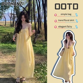 Duohanzi Váy nữ kiểu Pháp màu vàng treo váy mùa hè bên bờ biển kỳ nghỉ rộng Váy dài chữ A