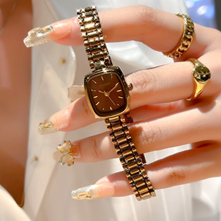  Đồng hồ vàng nhỏ phong cách mới đồng hồ nữ sang trọng niche thương hiệu nổi tiếng chống thấm nước thời trang retro nhỏ gọn sinh viên khí chất đồng hồ 