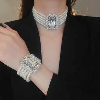 Ánh sáng Pháp sang trọng zircon nhiều lớp vòng cổ ngọc trai bông tai bộ vòng tay thời trang chuỗi xương đòn cao cấp cảm giác thích hợp trang sức