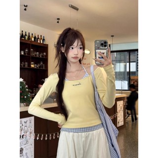 Mùa xuân 2025 mới lệch vai treo cổ chắp vá áo thun dài tay áo ngắn