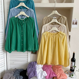 Mùa hè tay bóng bay retro phong cách nghỉ mát cotton vải lanh chống nắng áo sơ mi nữ