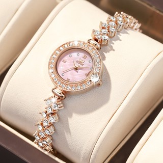 OPK Đồng hồ nữ Chống nước Mặt số vỏ trai hồng Viền đính đá Dây kiểu lắc tay Thạch anh 6054