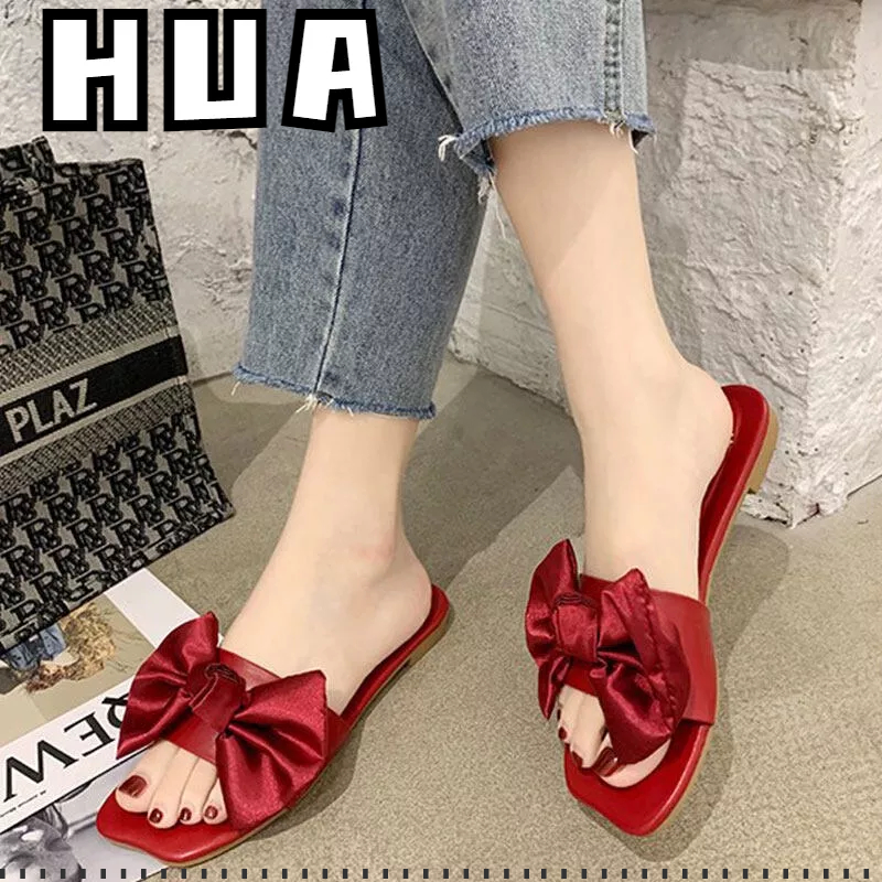 HUA mùa hè mới phong cách cổ tích xăng đan đế bằng và dép đi trong nhà nữ thắt nơ mặc bên ngoài hở ngón dép xỏ ngón gót phẳng