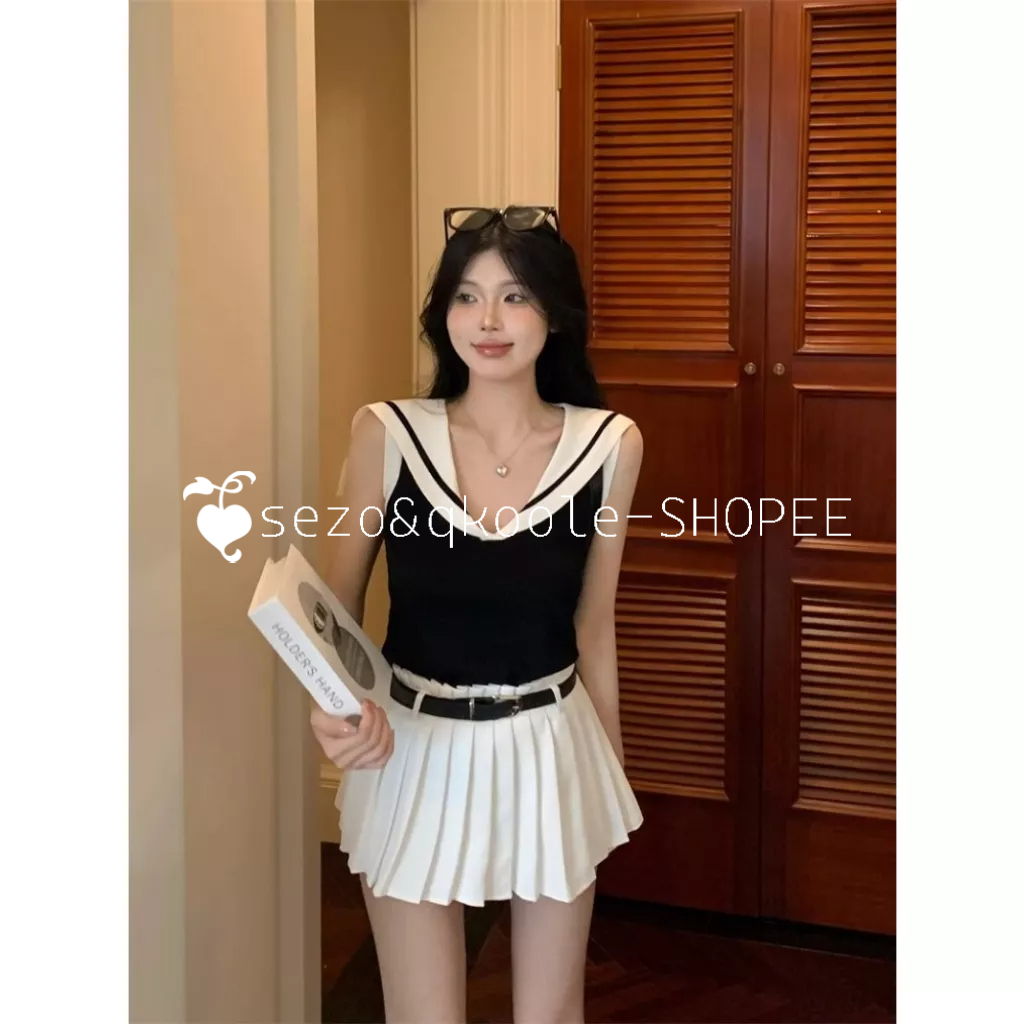 QKOOLE Mùa hè mới cô gái cay phong cách đại học dệt kim tank top thời trang v-cổ slim fit crop top