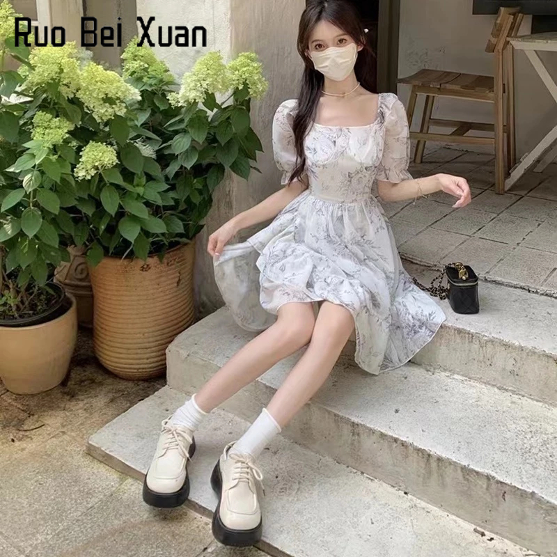 Đầm chữ A Ruo Bei Xuan tay phồng in hoa phong cách Pháp ngọt ngào thời trang mùa hè 2023 dành cho nữ