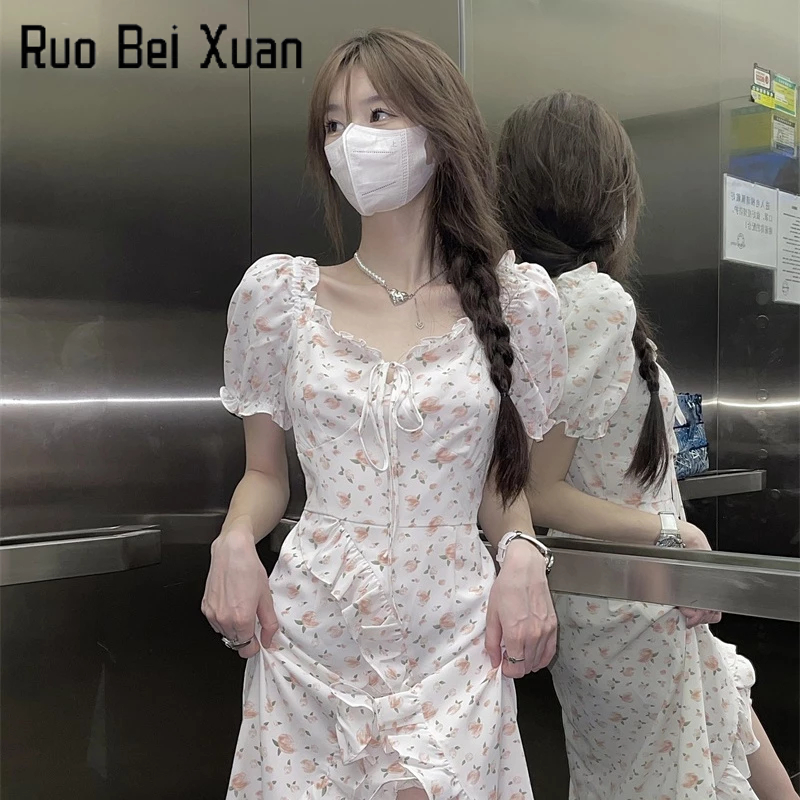 Đầm hoa Ruo Bei Xuan tay ngắn phối bèo nhún không đối xứng thời trang mùa hè cho nữ