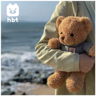 Thú nhồi bông hình chú gấu mặc áo len xinh xắn