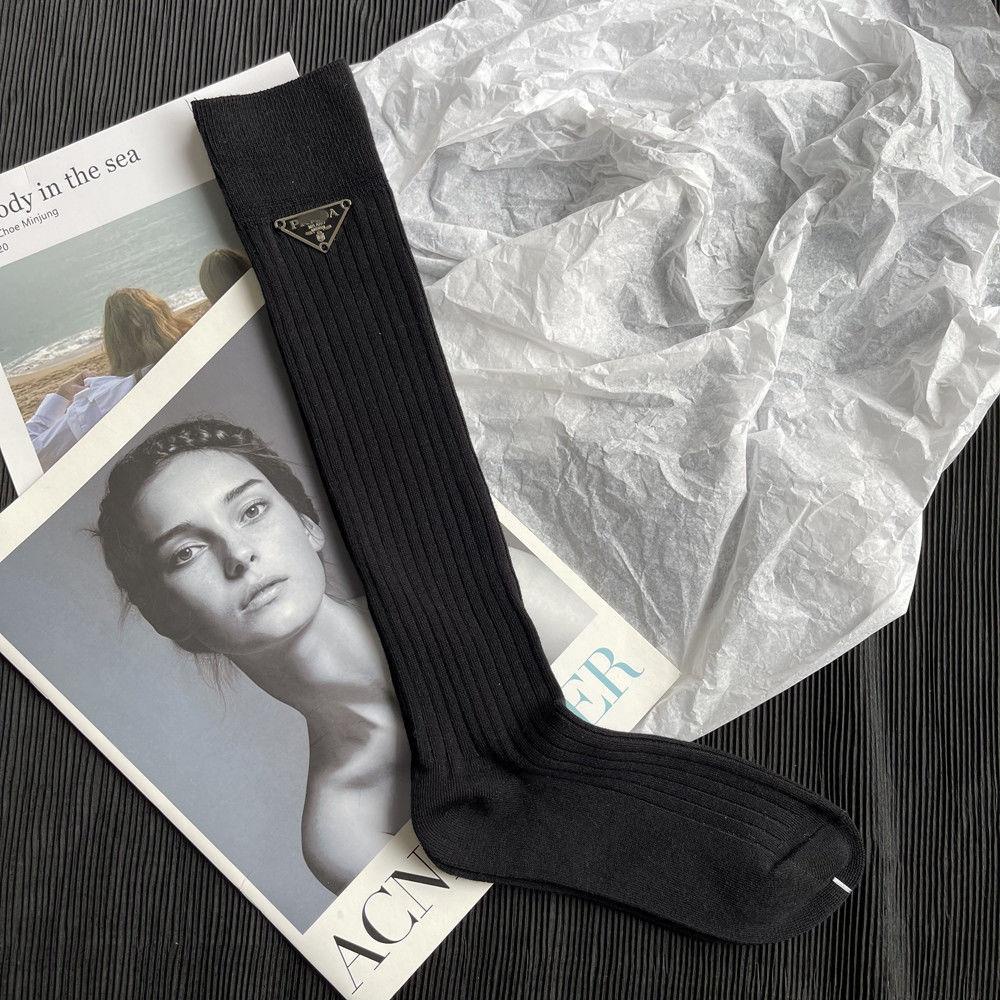 Prada triangular letter mid-length double-needle wide strip trendy brand stockings pure color luxury high-value women s