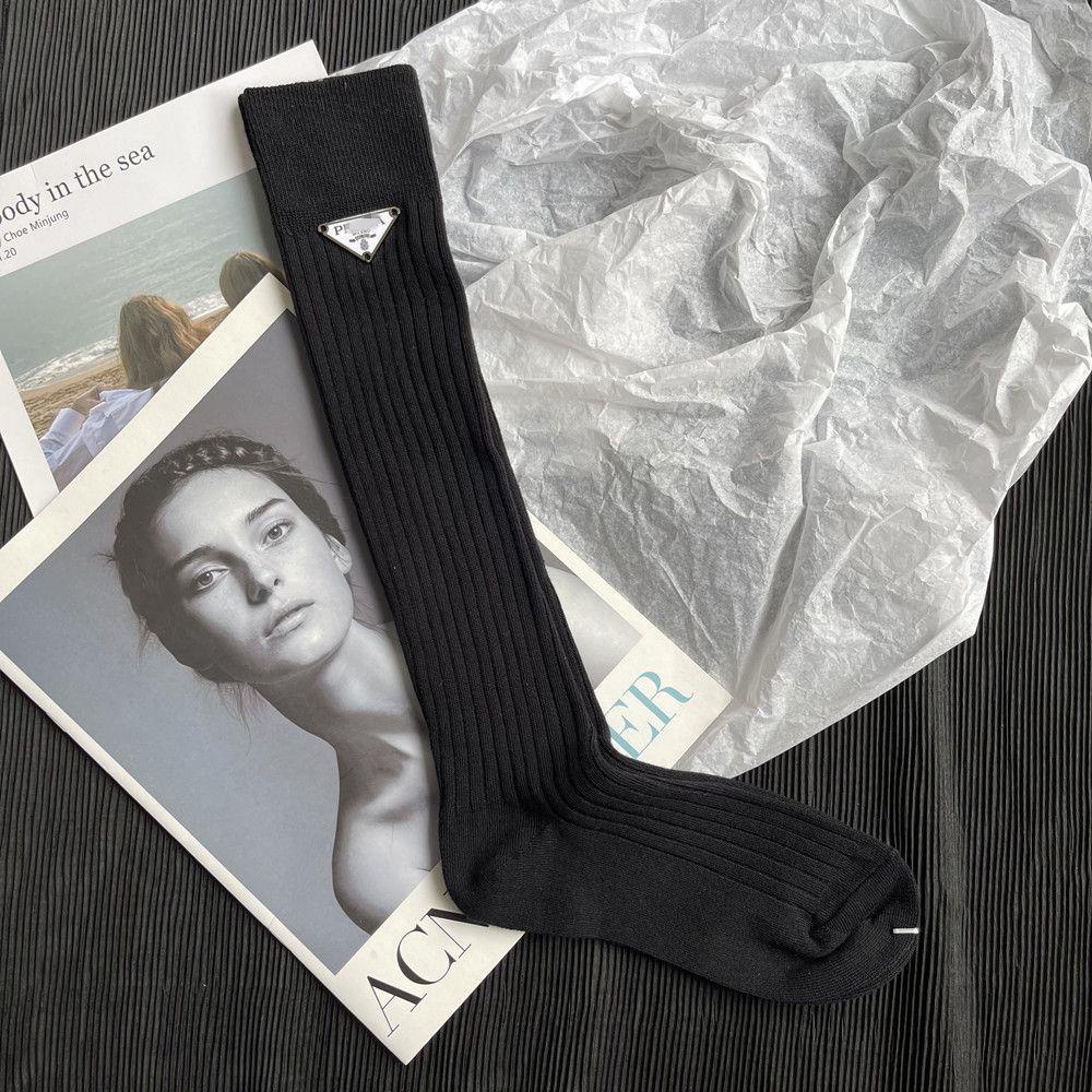 Prada triangular letter mid-length double-needle wide strip trendy brand stockings pure color luxury high-value women s