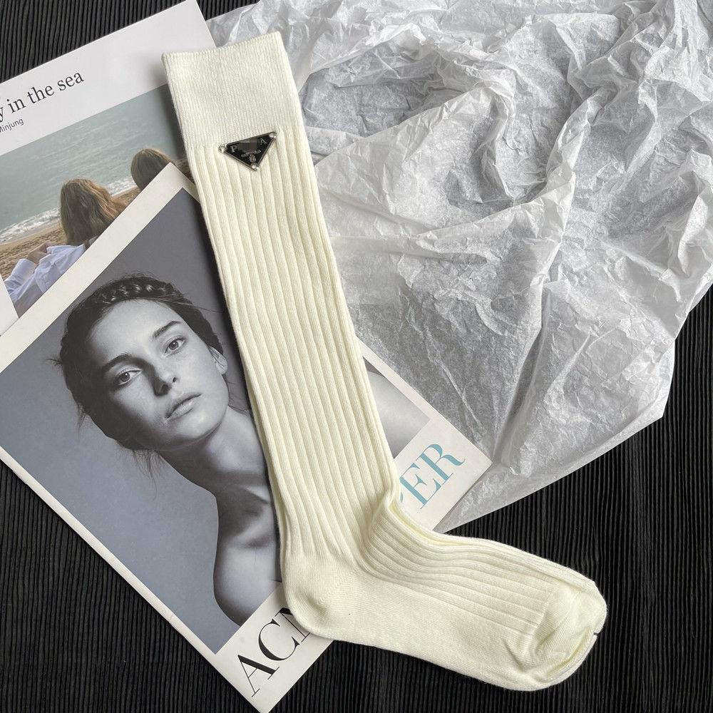Prada triangular letter mid-length double-needle wide strip trendy brand stockings pure color luxury high-value women s