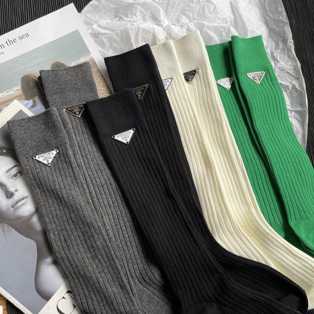 Prada triangular letter mid-length double-needle wide strip trendy brand stockings pure color luxury high-value women s