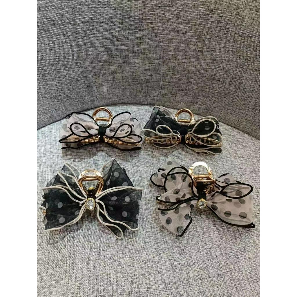 Kẹp càng cua nơ voan chấm bi gắn charm