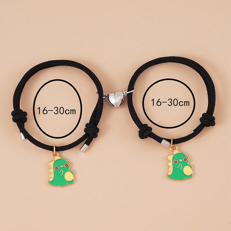 Set 2 vòng tay màu đen phối mặt hình khủng long có nam châm hình trái tim thời trang cho cặp đôi