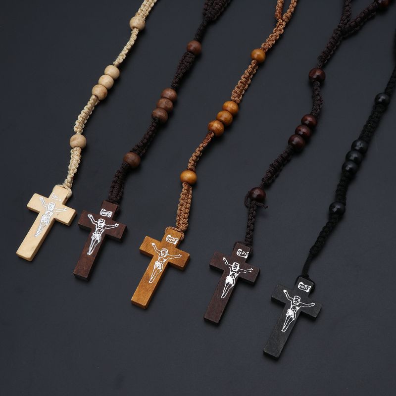 Dây chuyền dạng chuỗi hạt gỗ có mặt hình thánh giá chúa Jesus