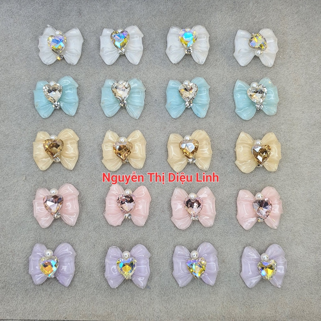 Charm nơ đính đá trái tim