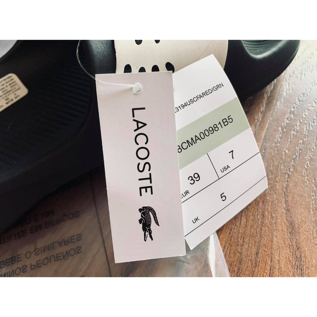 Dép đúc đen in cá trắng