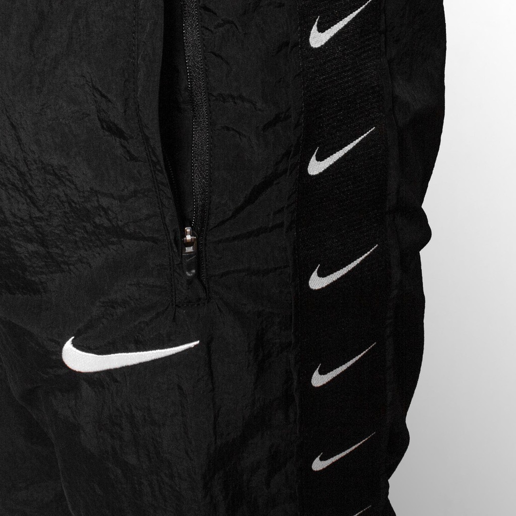 QUẦN DÀI NIKE SWOOSH TAPED SWOOSH POPOVER PANTS - ĐEN /TRẮNG
