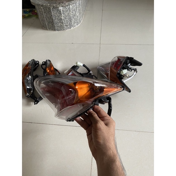 Đèn hậu Spark Thái Lan xi nhan cam