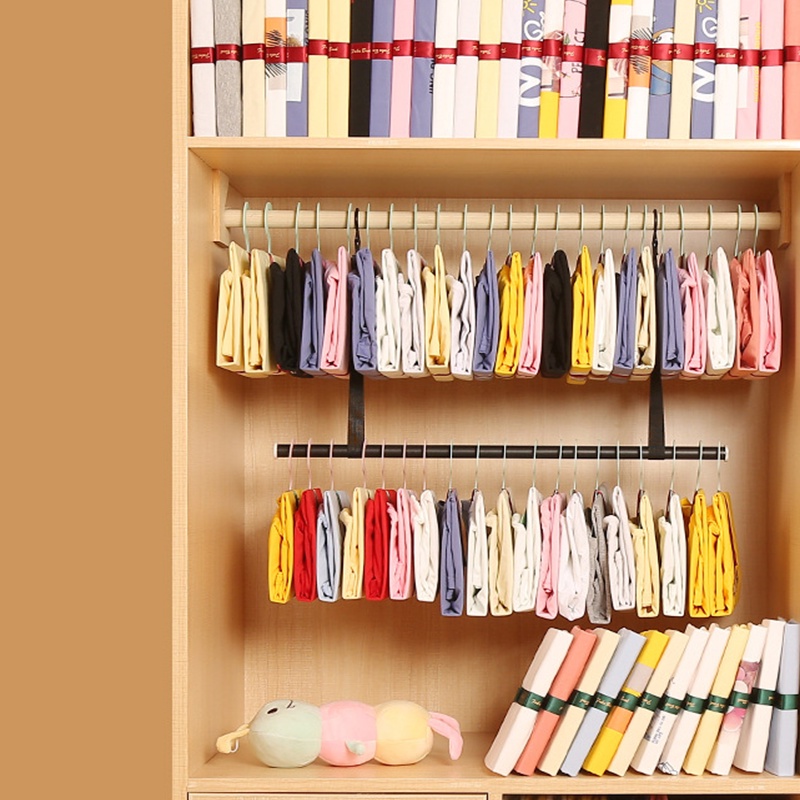 Dụng cụ gấp quần áo đa năng giúp sắp xếp và tiết kiệm không gian tủ quần áo gọn gàng hơn