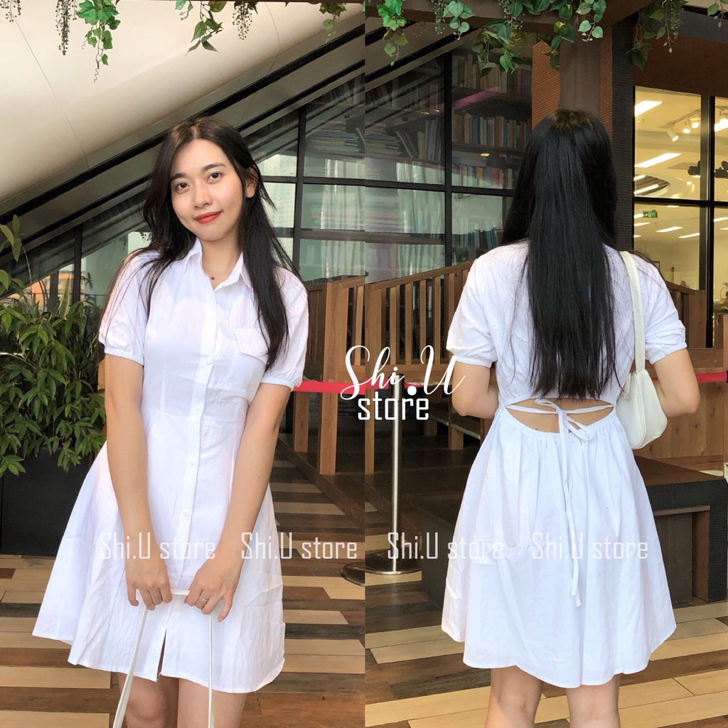 Váy sơ mi trắng túi ngực ngắn tay cut out lưng có dây buộc đầm thiết kế trắng hở lưng chất đũi