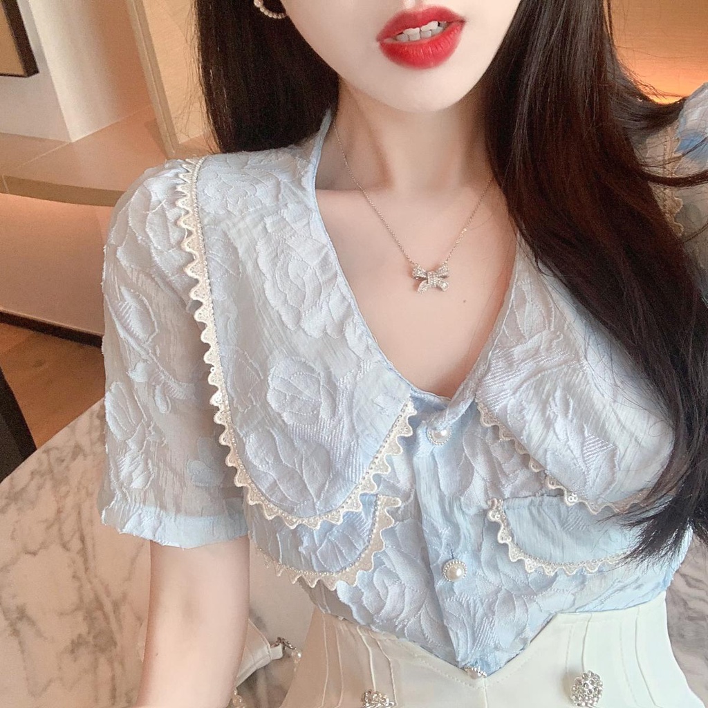 Set áo tay phồng ngắn cổ búp bê thêu ren + quần short eo cao ống rộng đính kim sa kiểu Pháp