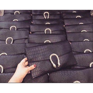 Ví clutch đầu rồng