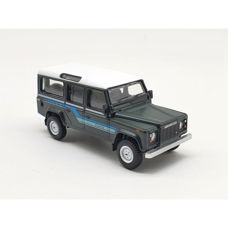 Xe Mô Hình Land Rover Defender 1985 County Station Wagon Grey RHD 1:64 Mini GT (Đen)