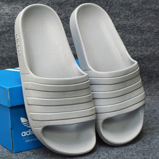 Dép trẻ em Adidas Adilette Aqua Kid màu xám sọc bóng