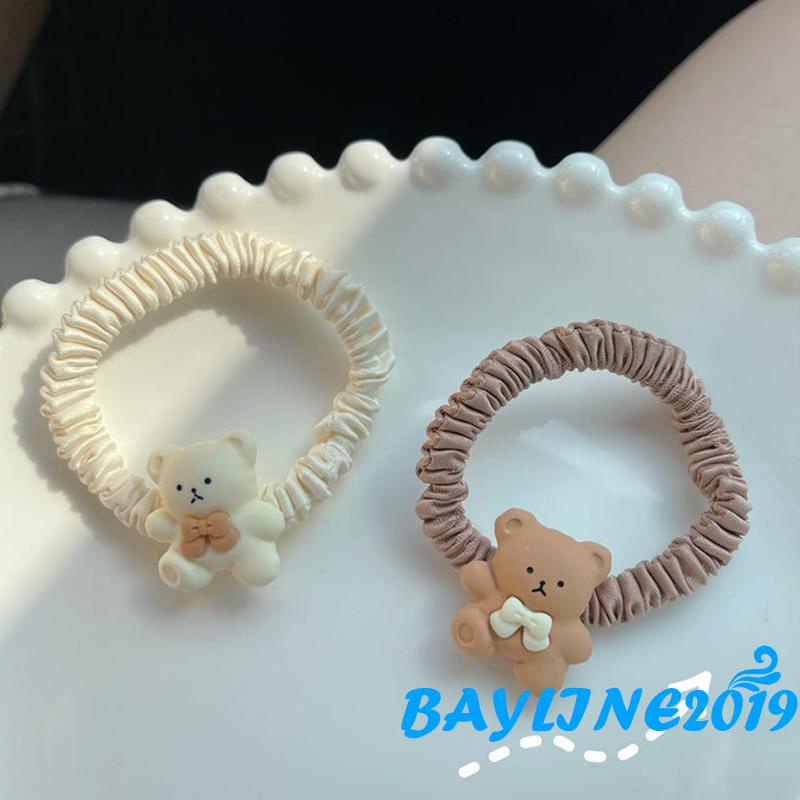 Dây buộc tóc hình gấu dễ thương cho bé gái