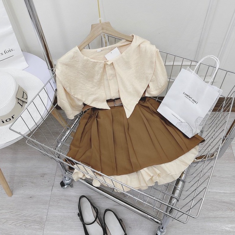 Sét áo sơ mi cổ sen chất đũi, kèm chân váy kaki vạt bèo dáng xòe bao xinh