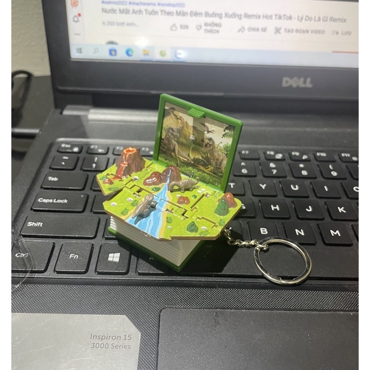 Móc khoá quyển sách mở ra không gian vũ trụ , kỉ nguyên khủng long - Quà lưu niệm dễ thương