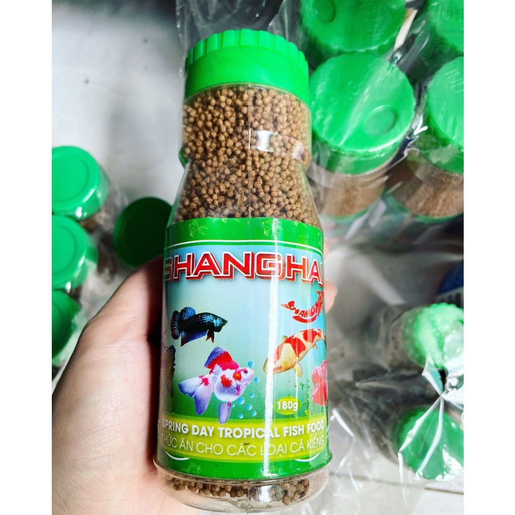 Thức ăn cám cho cá cảnh Shanghai lọ nhỏ tiện dụng lọ trung 100g,180g