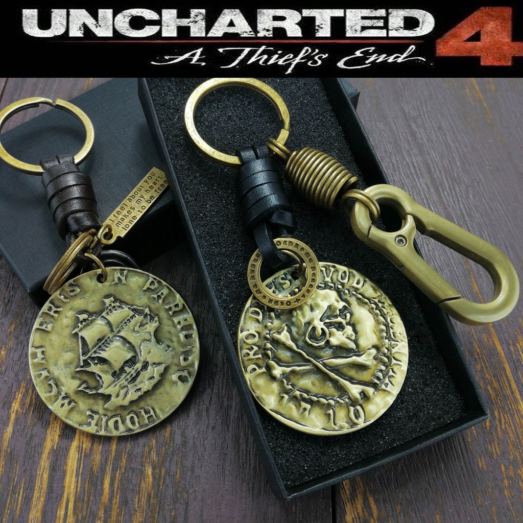 Móc khóa mặt đồng xu khắc chữ game Uncharted 4: 4 Christina