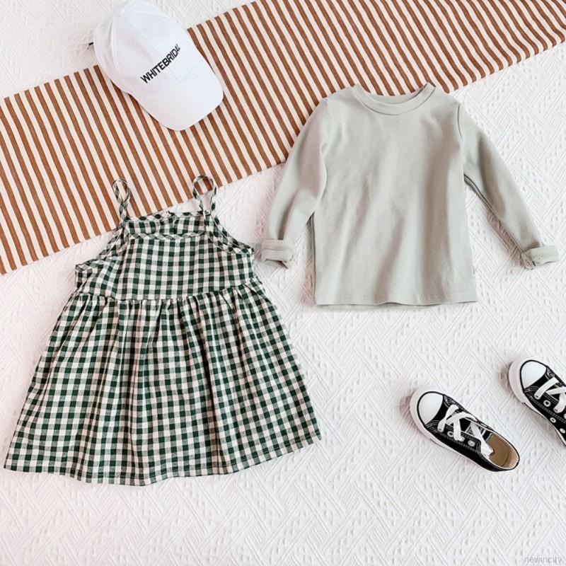 Bộ áo thun dài tay kẻ ca rô + váy yếm dễ thương cho bé