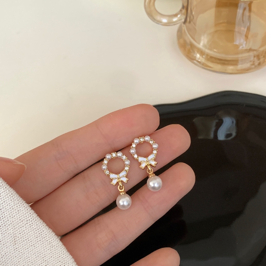 Khuyên Tai Dạng Kẹp Không Xỏ Lỗ Hình Nơ Đính Ngọc Trai Trắng Đơn Giản CEa1203